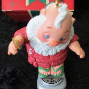 Vintage Pre-Owned 1986 Hallmark Santa Christmas Ornament 'Tipping The Scales'